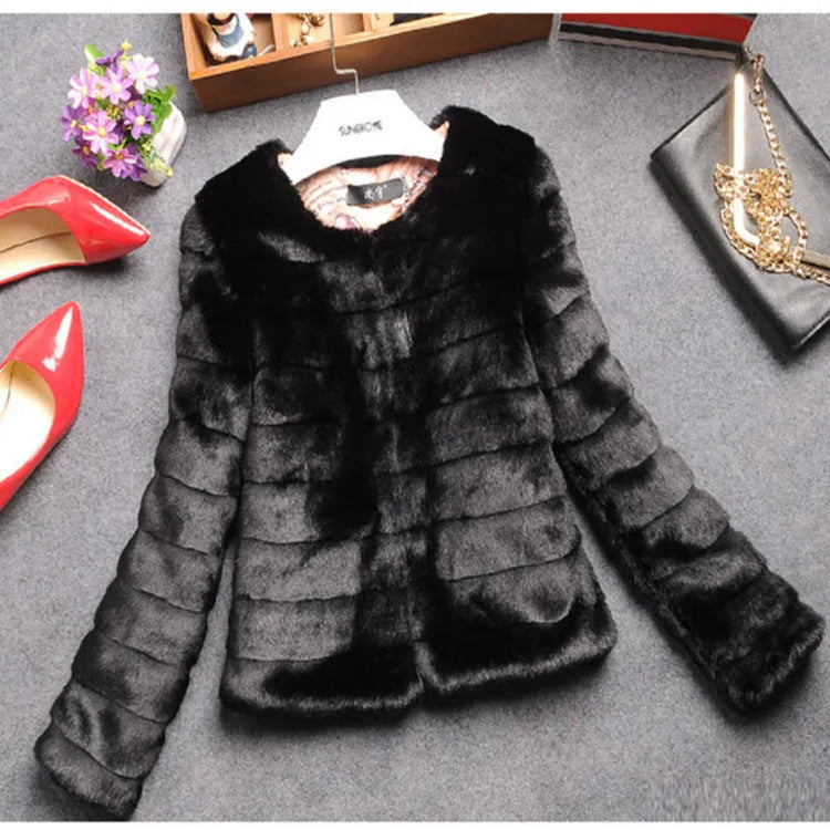 Women's short length faux fur top in white, black or beige with regular sleeves, 40cm length