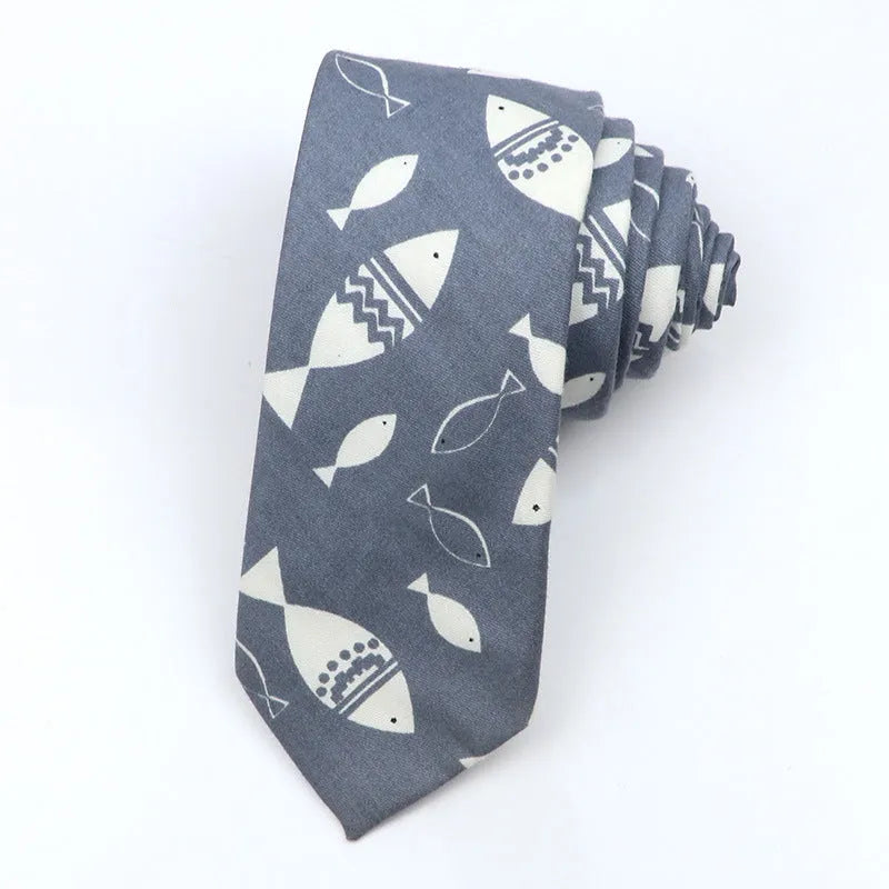 Men's narrow cotton bow tie in a cartoon print with an adjustable knot, shown in a selection of colours.