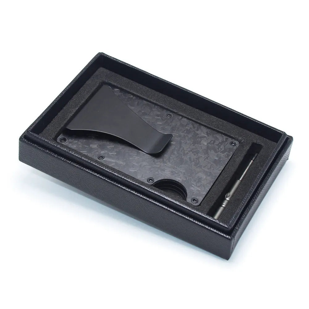Geometric carbon fibre and aluminium slim card holder wallet in multiple colour options on a table.