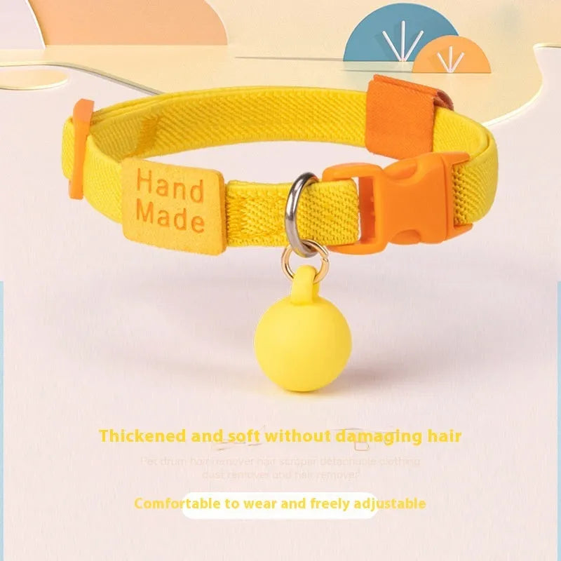 Solid colour elastic polyester dog collar for small breeds, shown in various colours on a white background.