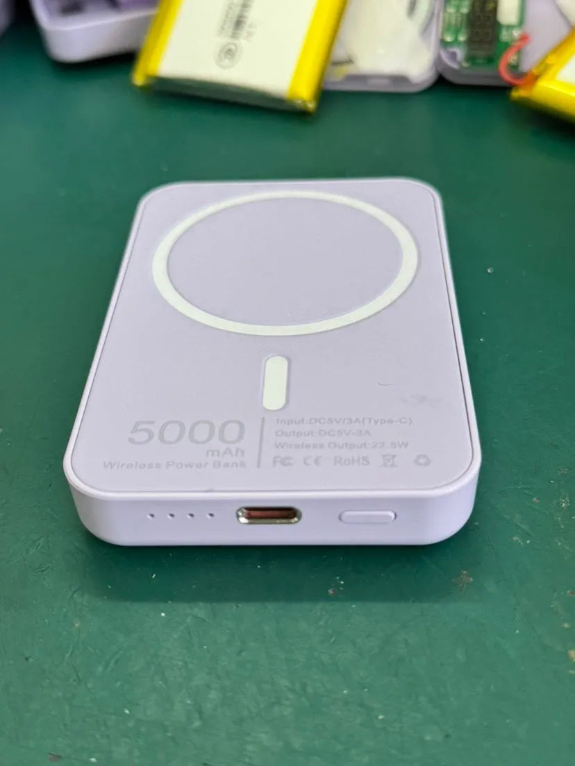 Magnetic wireless charger power bank in pink, purple or white colour with 5000mAh capacity