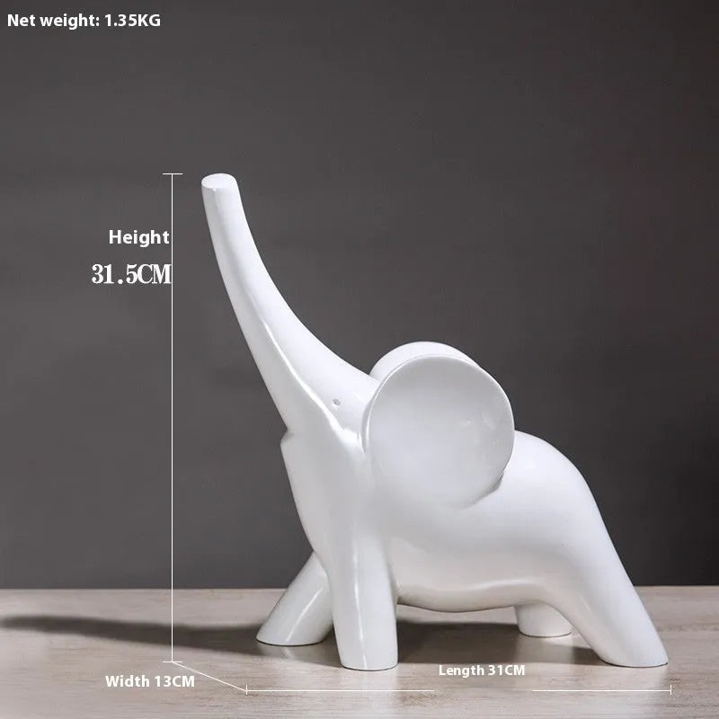 Modern resin elephant ornament in rose gold or white colour, available in large and small sizes.