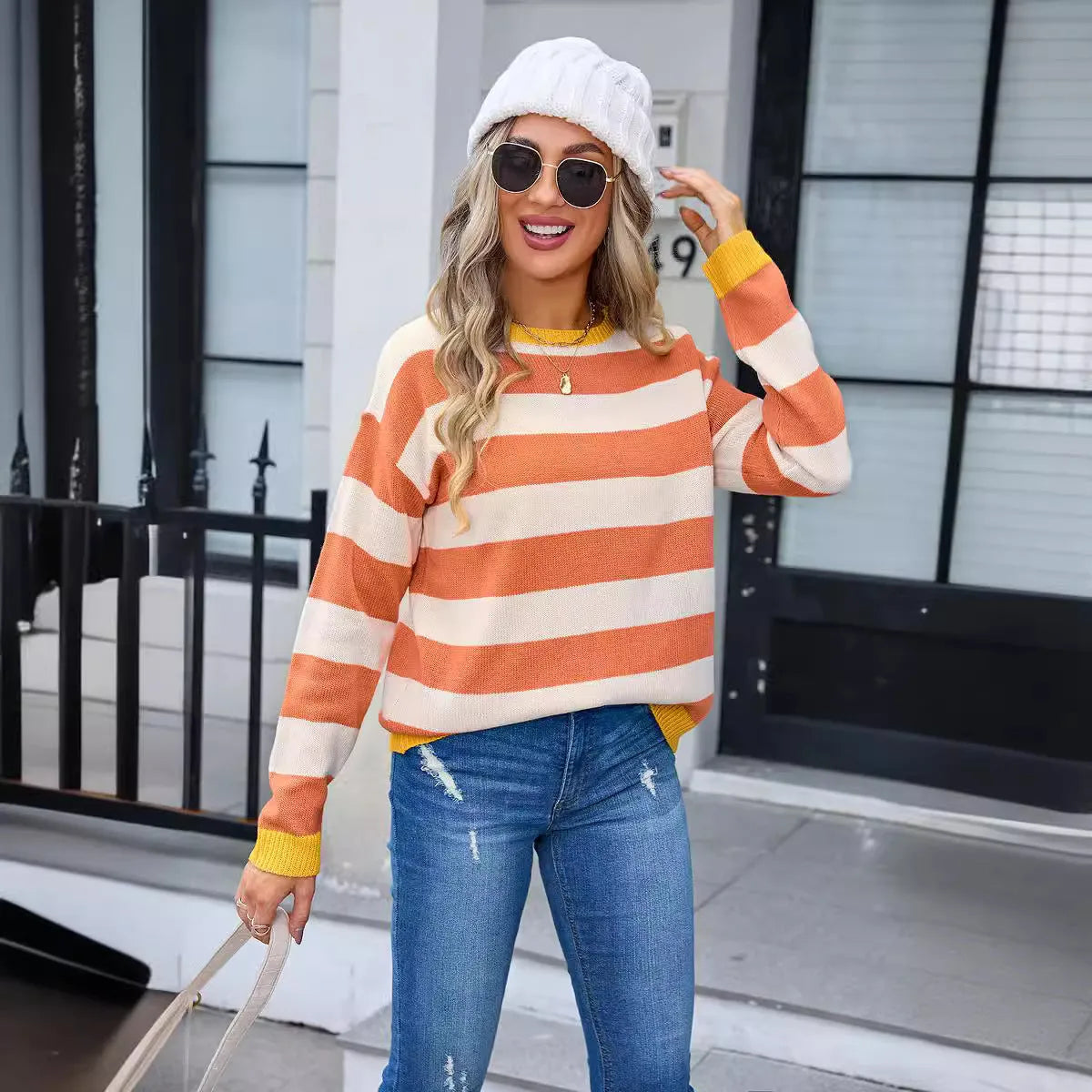 Women's loose fit long sleeve acrylic sweater in blue, round neck, knitted texture