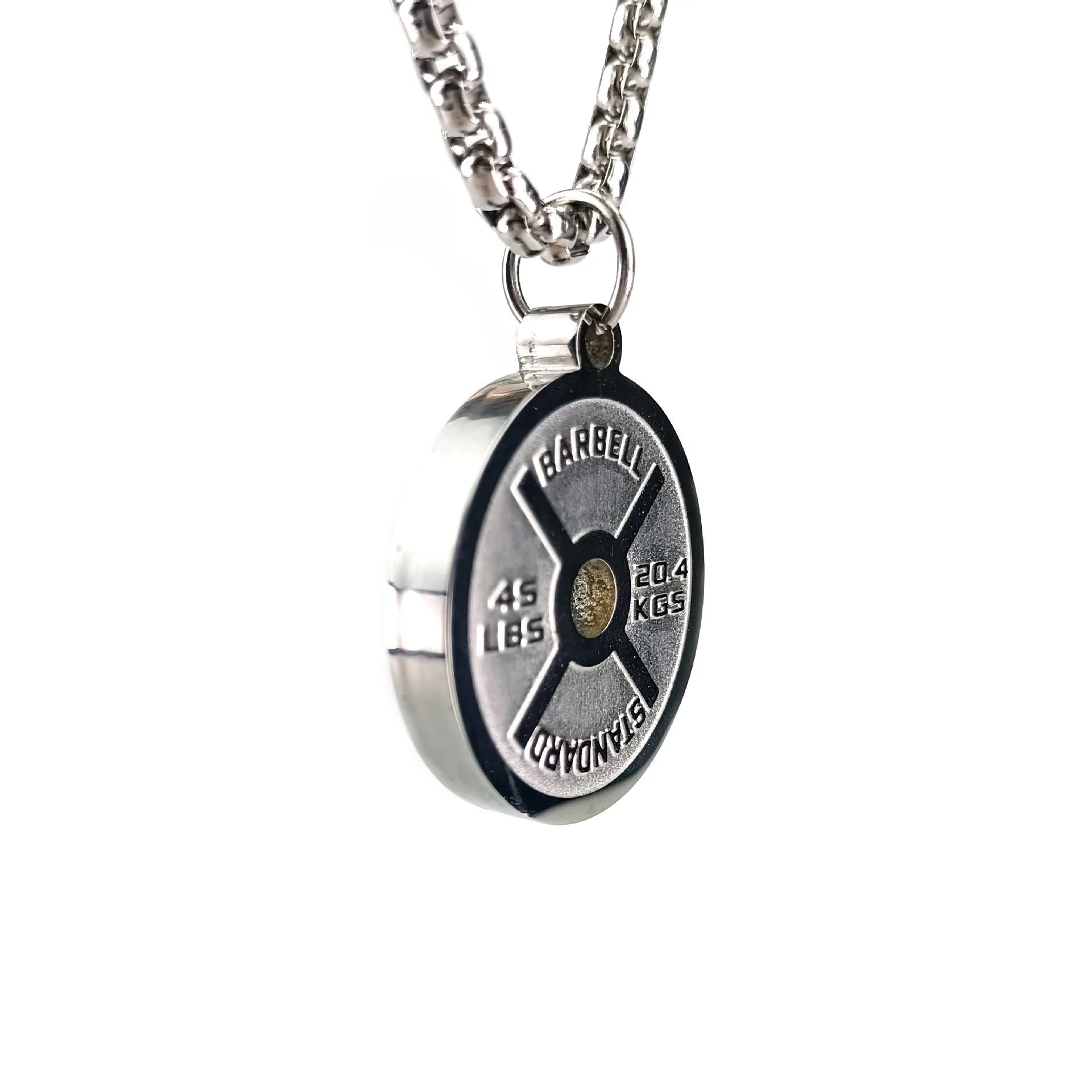 Polished stainless steel geometric barbell disk pendant on a choice of 60cm chains: black, gold, or pearl.
