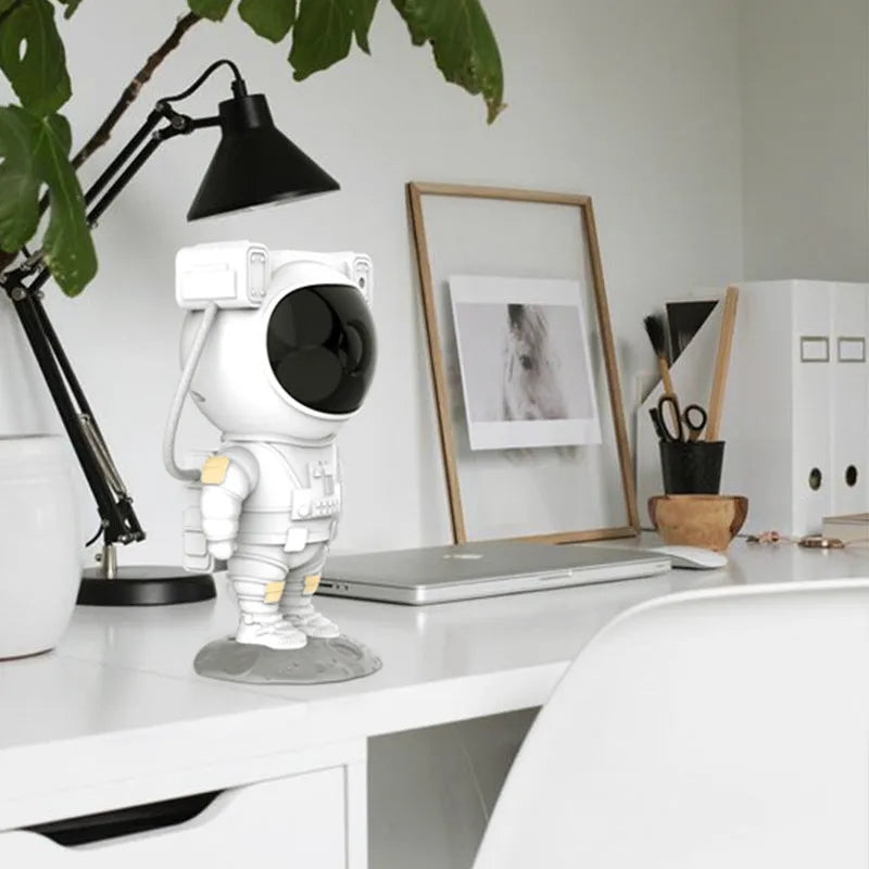 Creative astronaut galaxy starry sky projector nightlight on table with remote control, black finish
