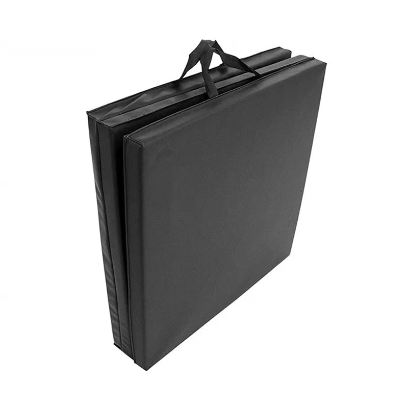 Tri fold sports gym mat in black, 180x60x4cm PU soft sponge, folded and laid flat on floor
