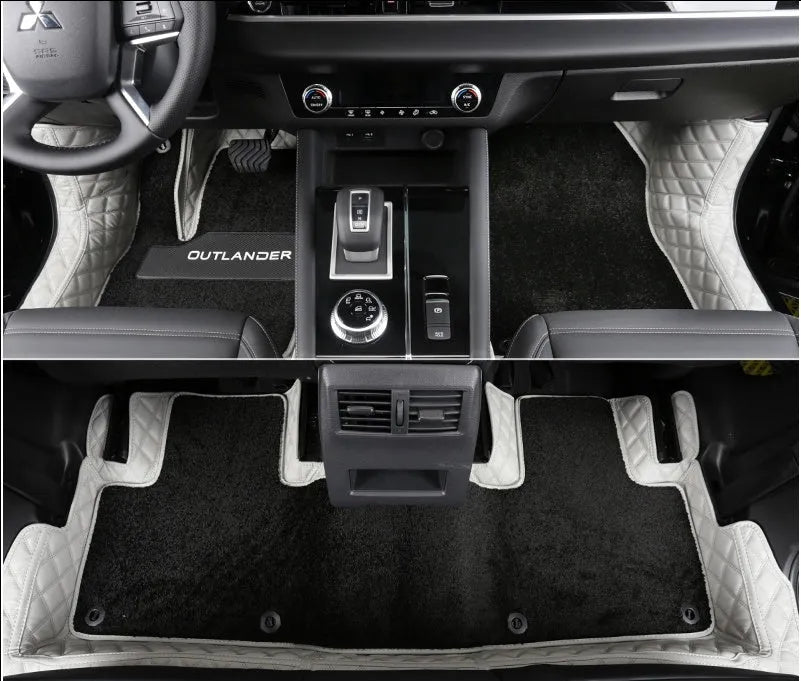 Custom black PU floor mats installed in a Mitsubishi Outlander footwell.