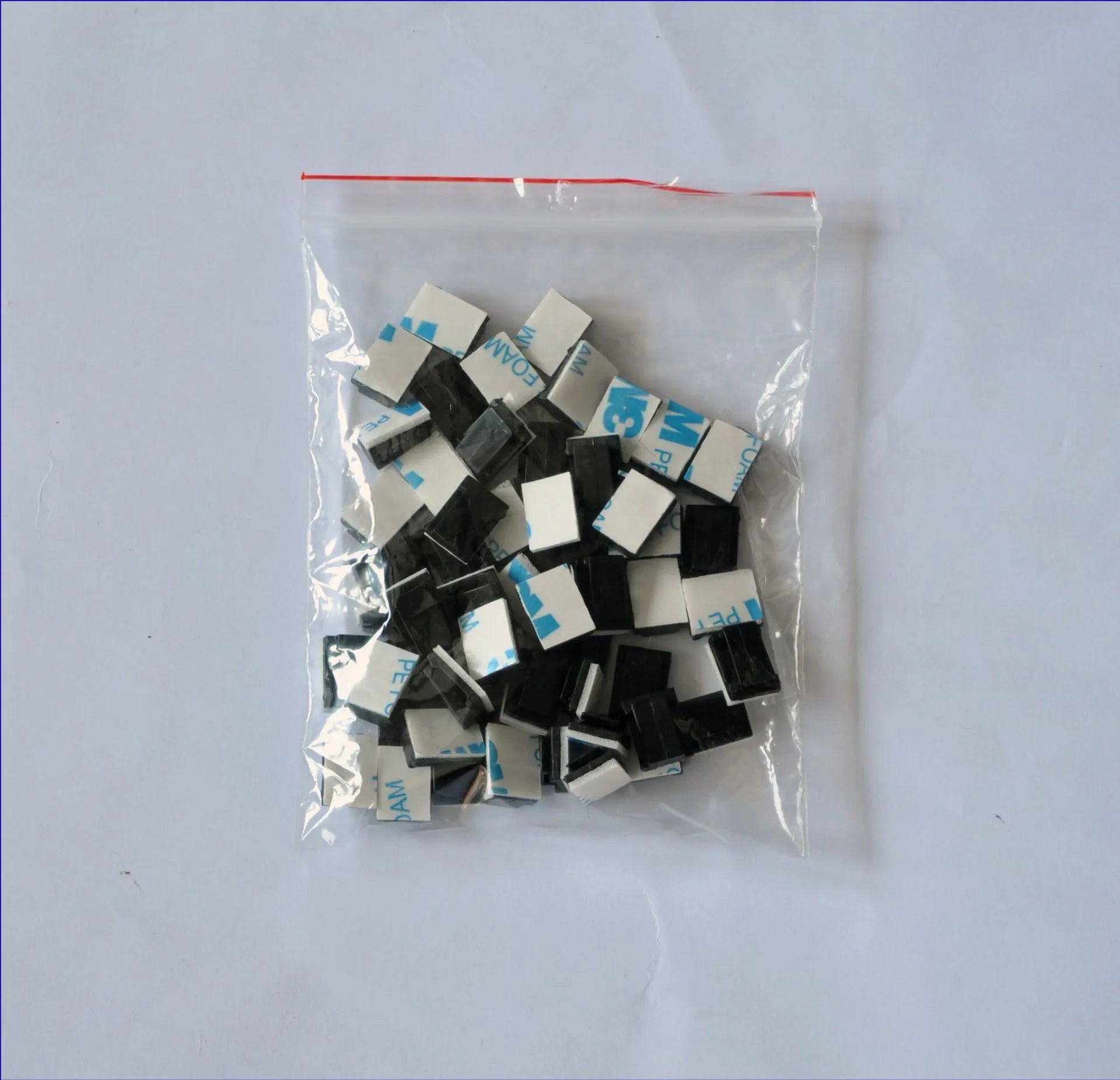 Black PA66 plastic automotive wire retaining clips for cable management in cars.