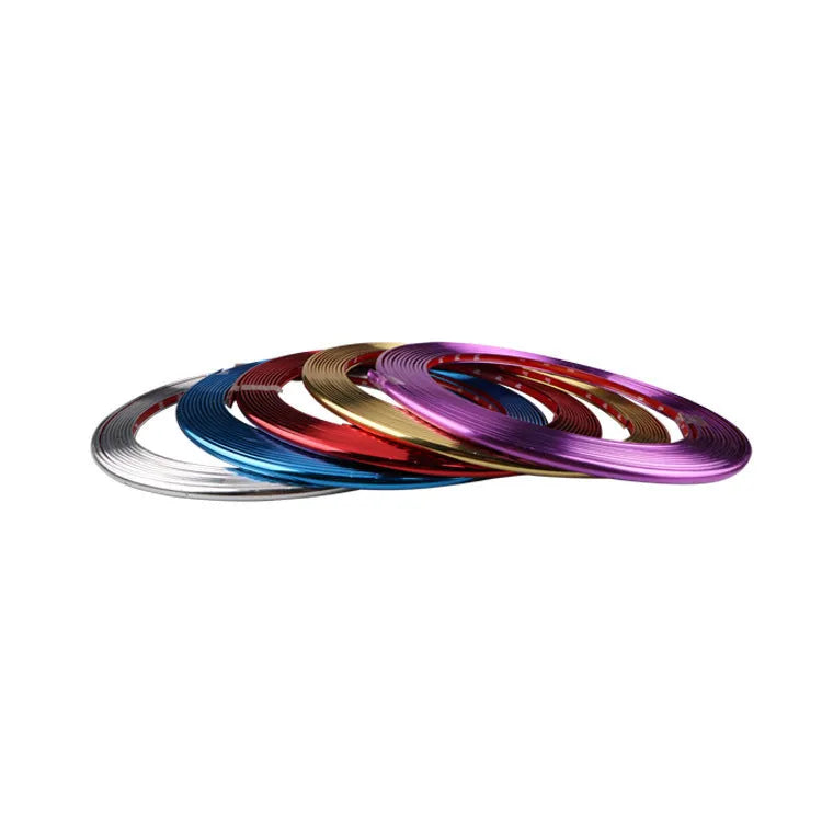Roll of galvanised purple PVC wheel hub trim guard strip, 8 metres long.
