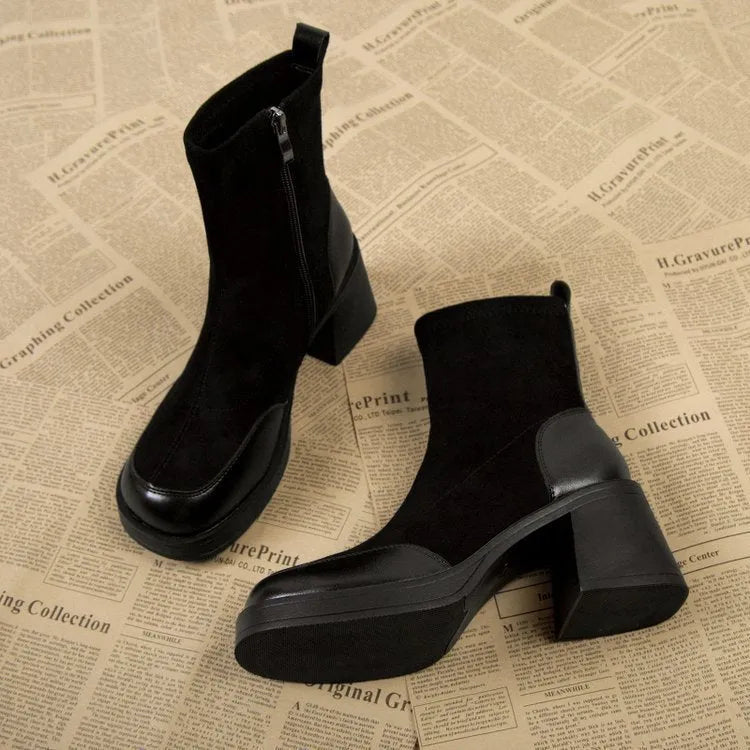 Black women's chunky heel martin boots with thick rubber sole and lace-up design