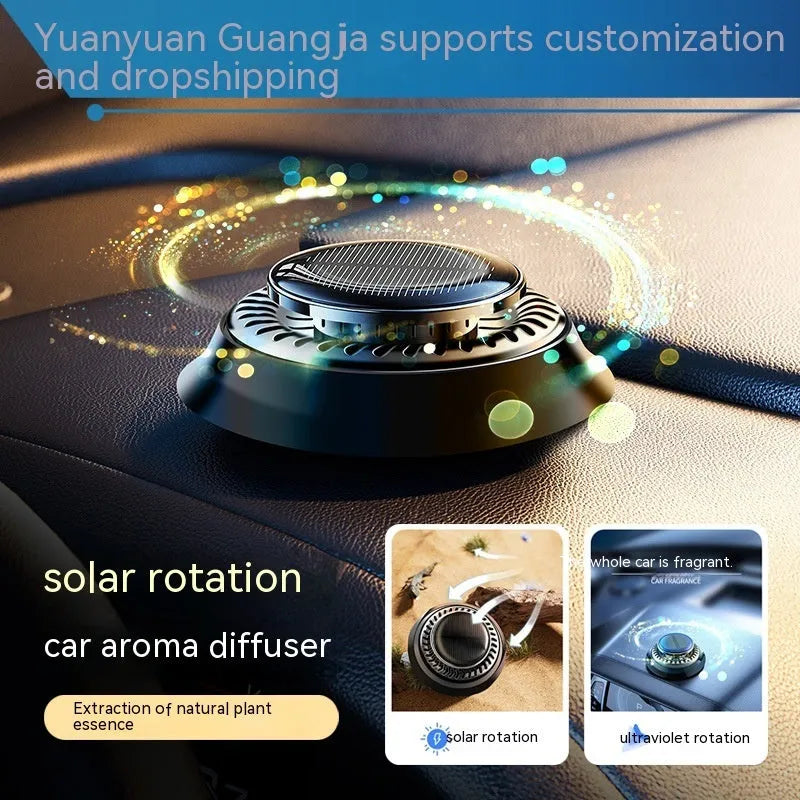 Solar-powered kinetic car air freshener with rotating double rings in black plastic with wood slice accents