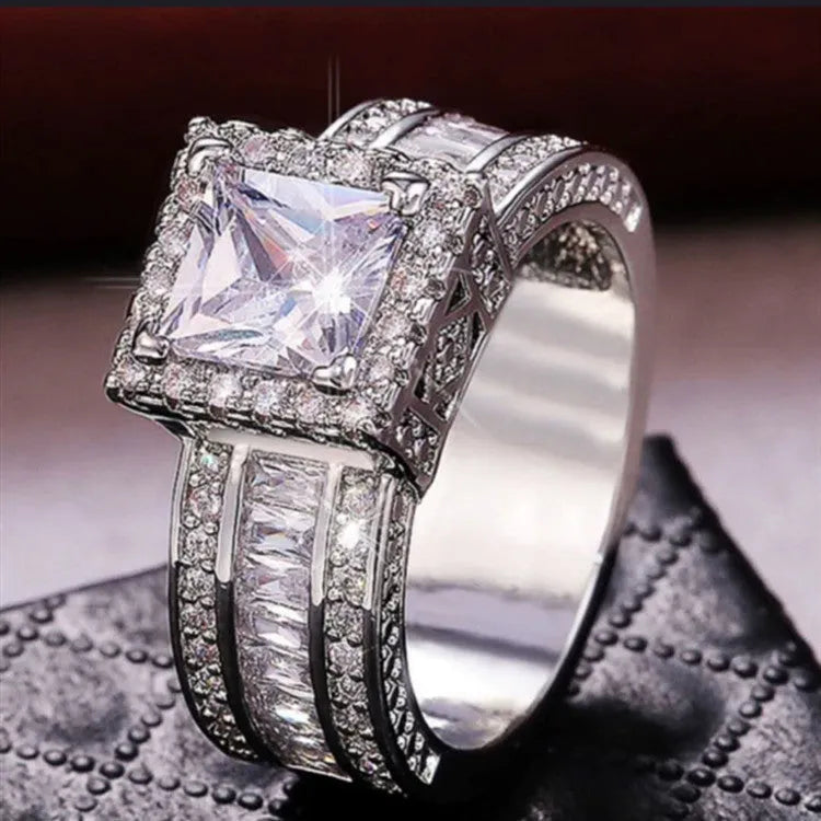 Women's geometric fashion ring with round elements in silver-colour electroplated finish