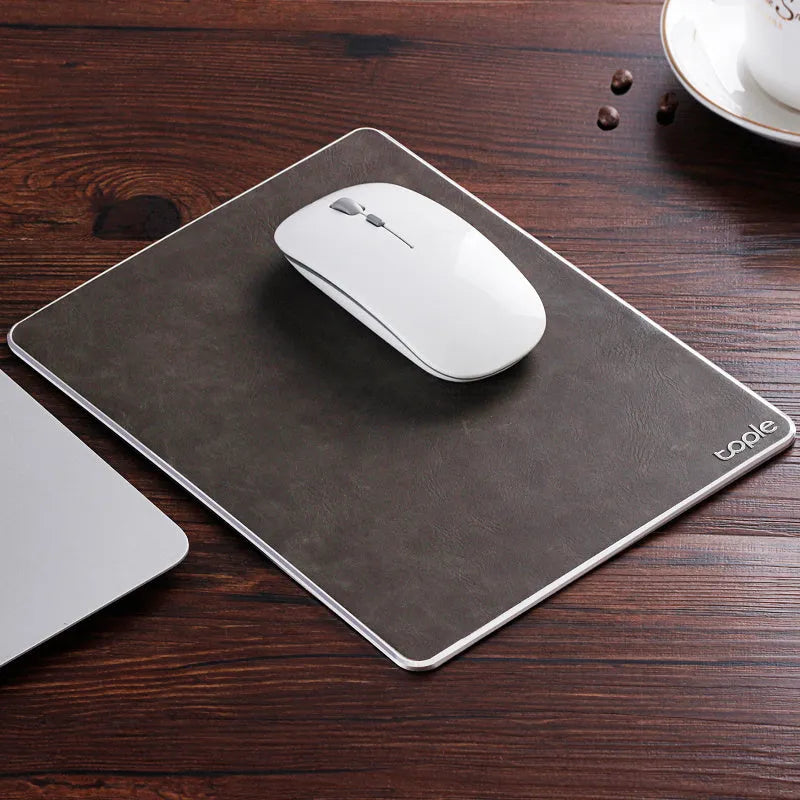 Oversized metal aluminium alloy mouse pad in black with PU leather surface and silicone base, 249x200x3.2mm, CNC chamfered edge