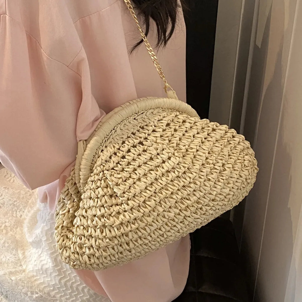 Khaki straw shoulder bag with shell shape design and internal zipper pocket