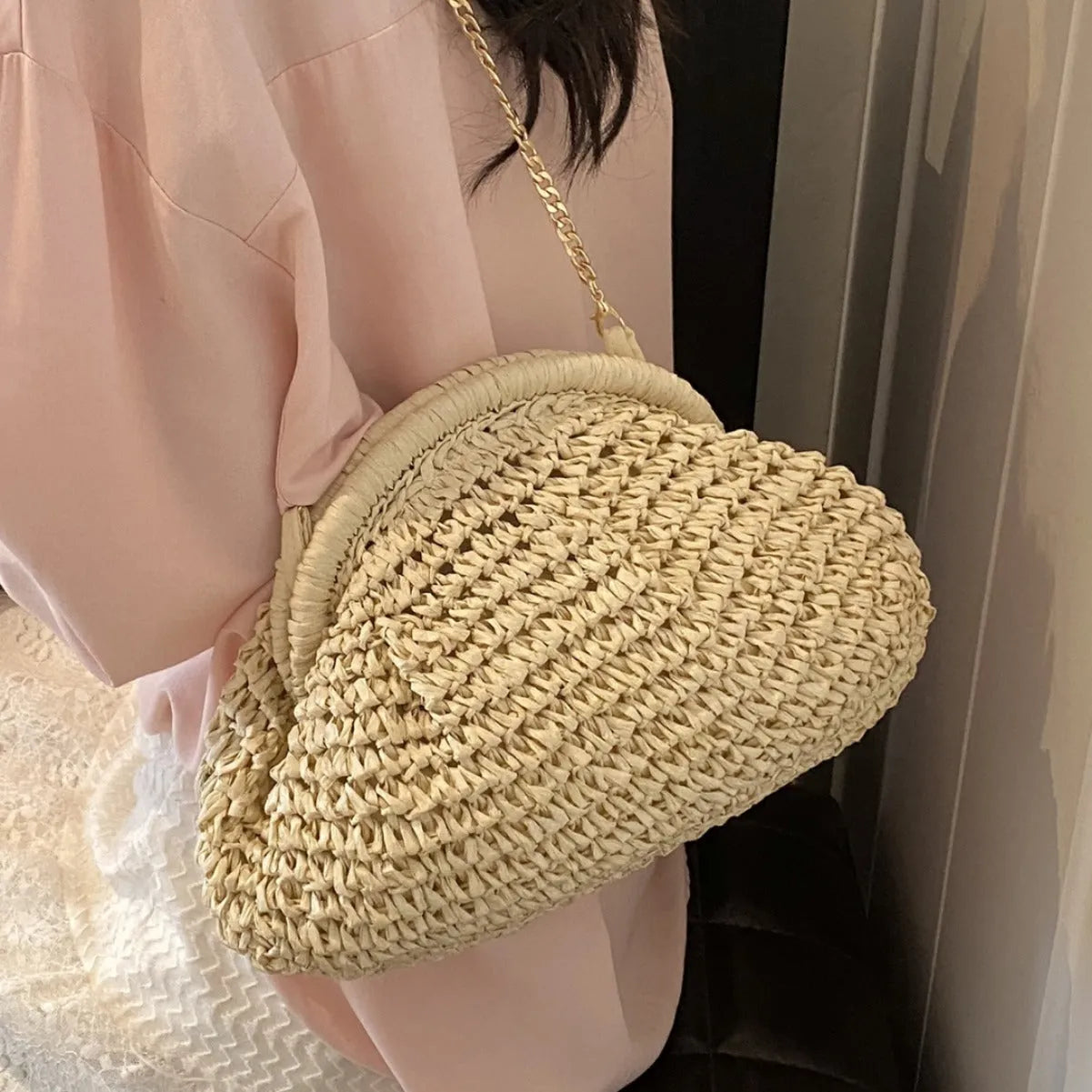 Khaki straw shoulder bag with shell shape design and internal zipper pocket