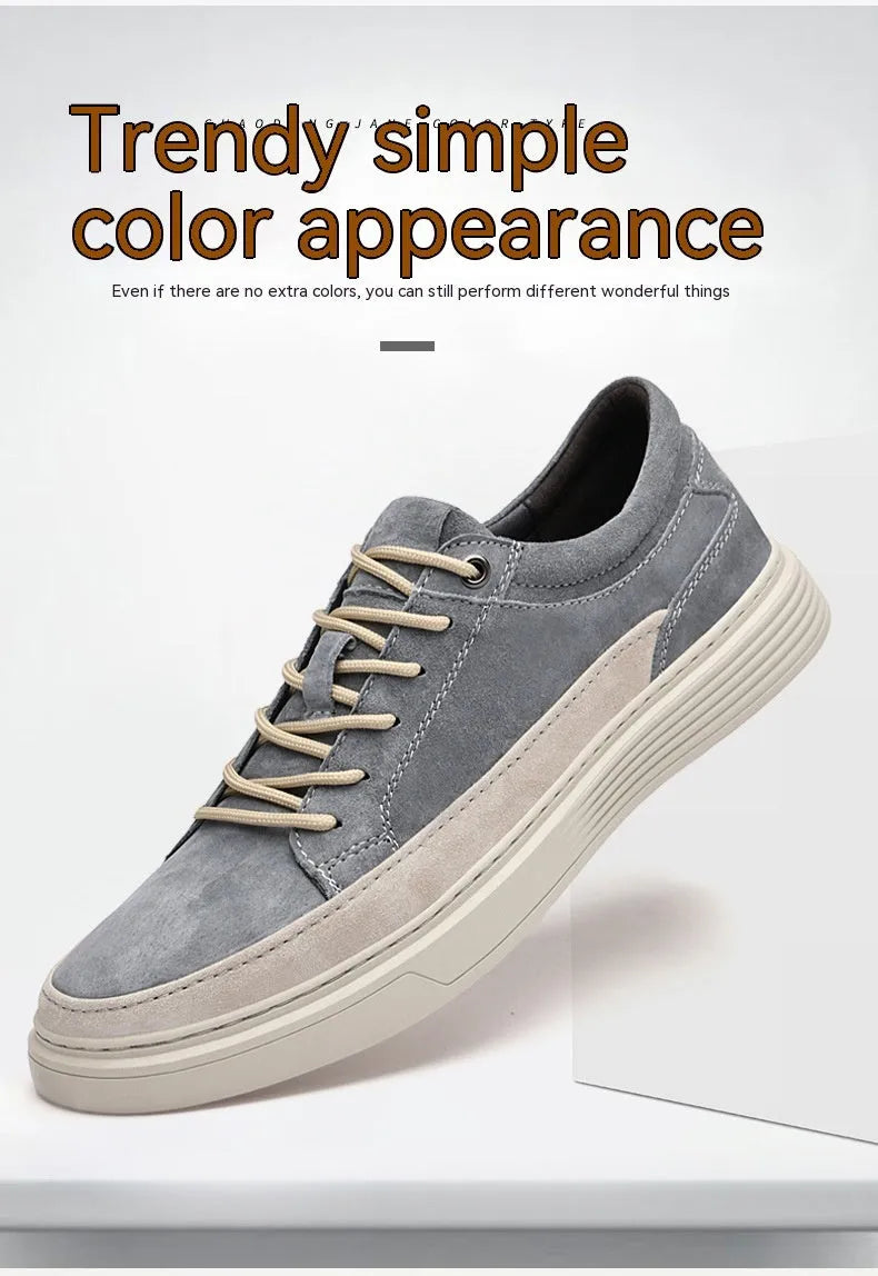 Men's grey pigskin leather casual skate shoes with flat rubber sole and lace-up front.