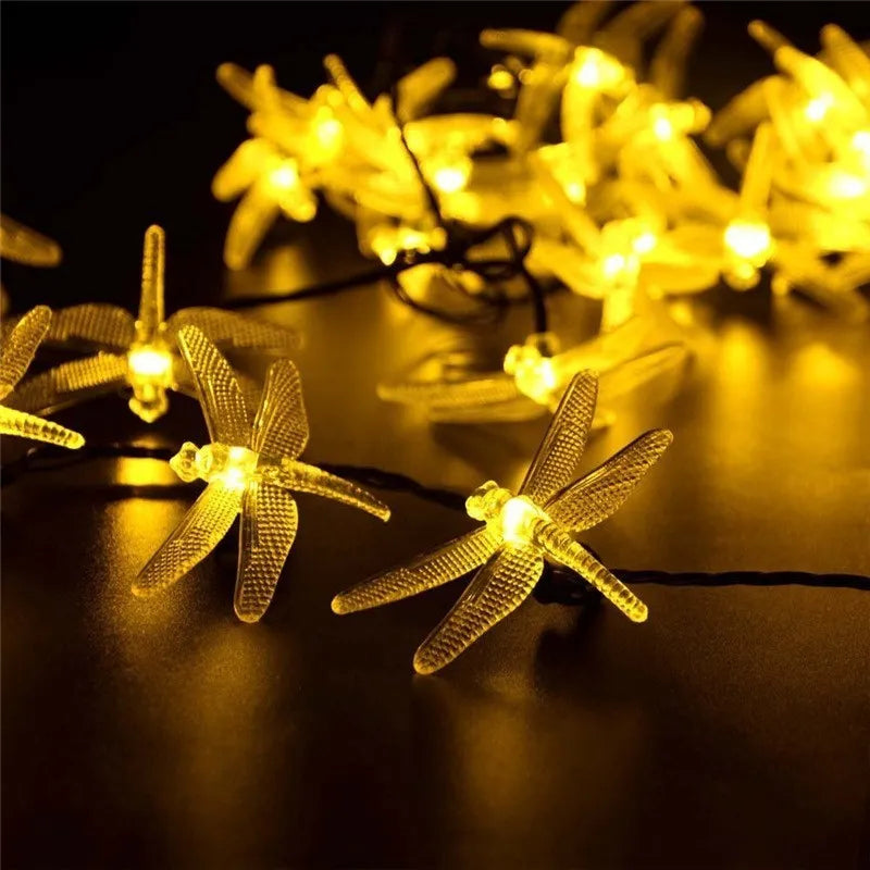 Outdoor solar LED string light with 30 warm white bulbs on a 5-metre cable, solar panel with spike, IP65 waterproof