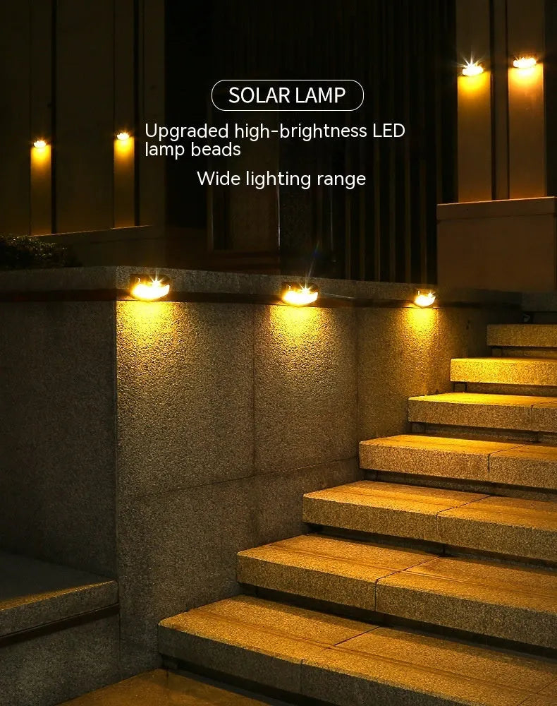 Solar-powered smiling face outdoor wall light for garden decoration