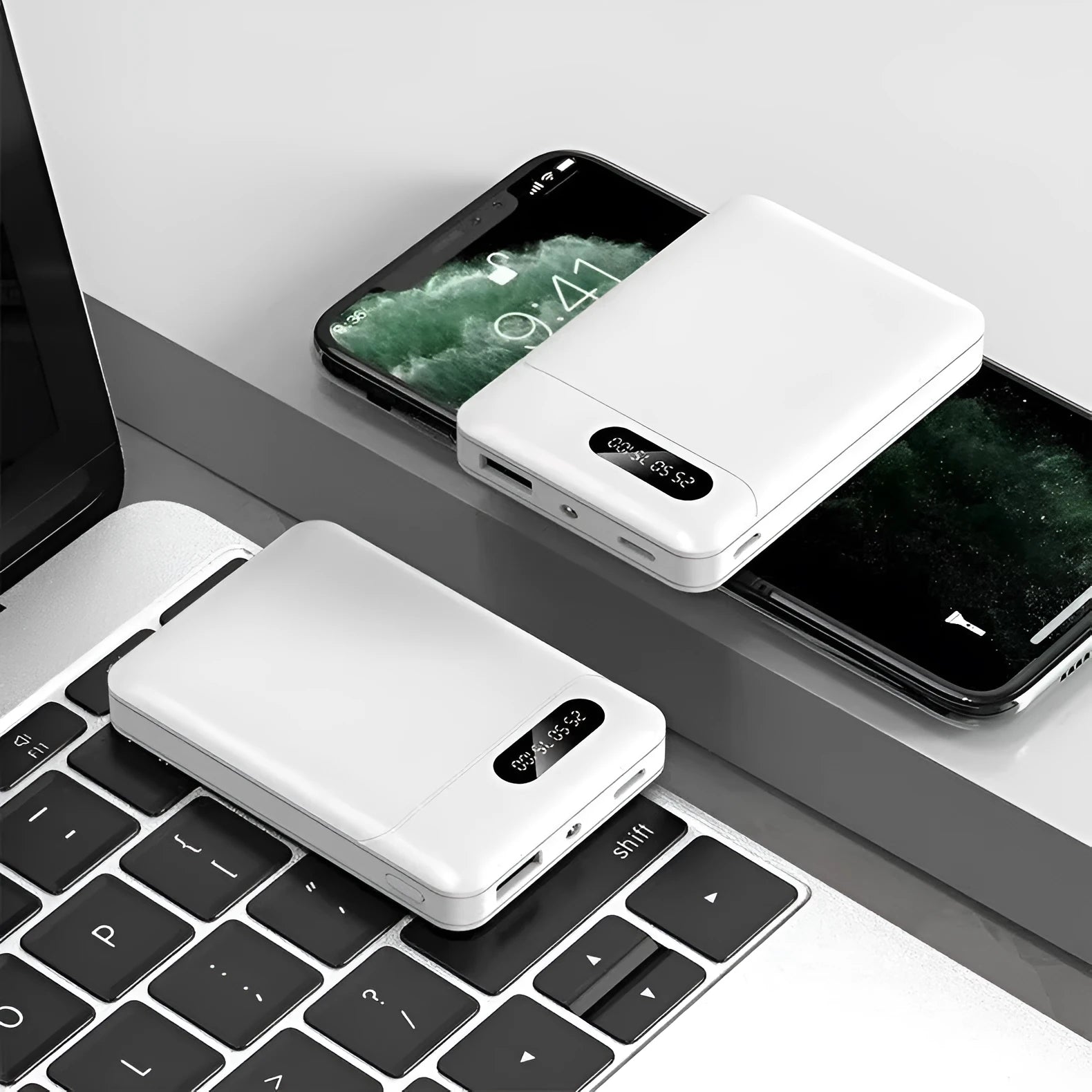Black and white portable power bank with multi-USB ports showing 10000mAh capacity label