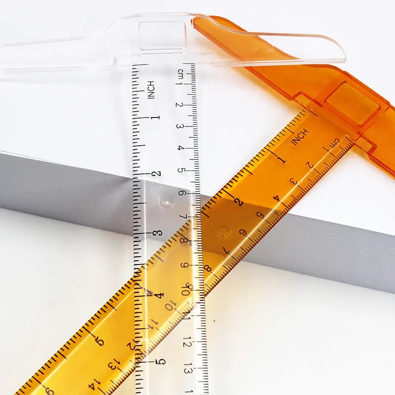 Transparent plastic T-shaped ruler with measurement scales for student design work