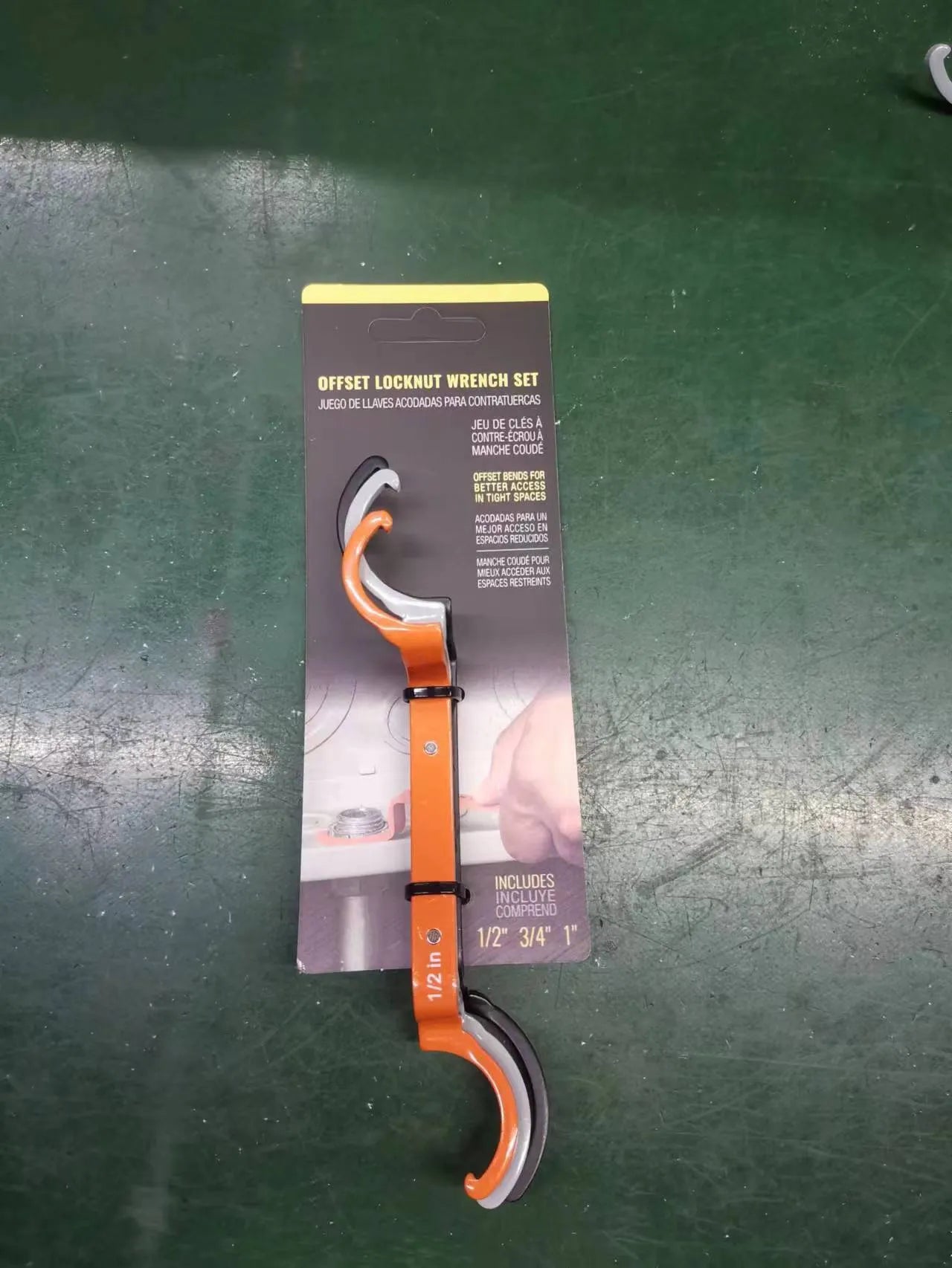 Three colour-coded magnetic suction wrenches with catheter locking in orange, grey, and black