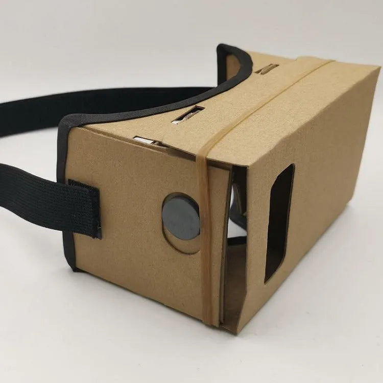 Pink and white cardboard VR glasses for smartphones, shown with 3D lenses and a rubber headband.