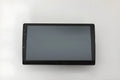 10.1 inch Android car head unit with touch screen, trapezoid panel design and universal fitting for vehicle dashboards