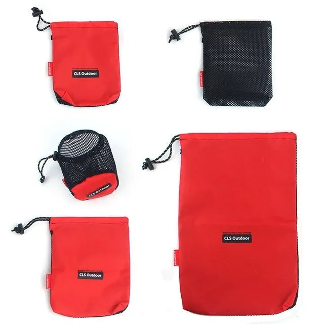 Set of five red outdoor travel storage bags made from Oxford cloth and mesh with zippers.