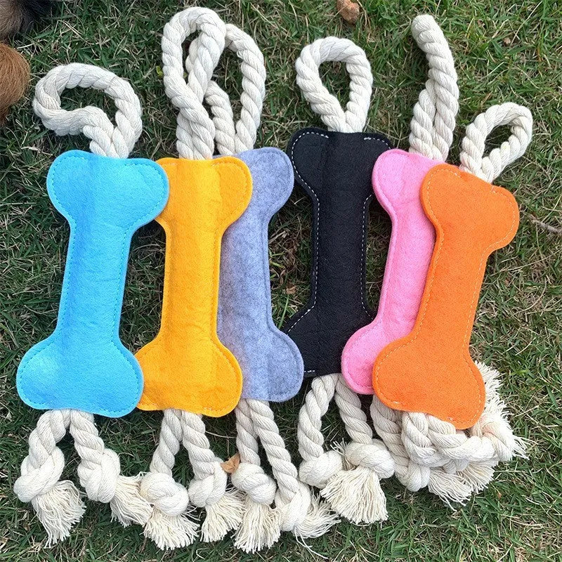 Bone-shaped dog chew toy with felt exterior showing rope knot texture inside, 16cm long in blue colour