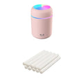 Pink USB desktop humidifier with colourful LED lights and 300ml water tank on wooden desk