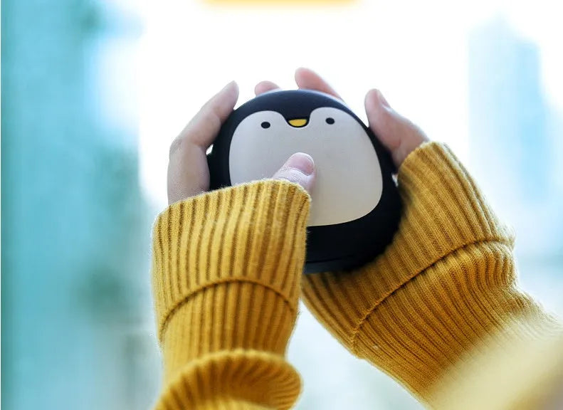 Cute cartoon penguin and polar bear design USB rechargeable electric hand warmer.