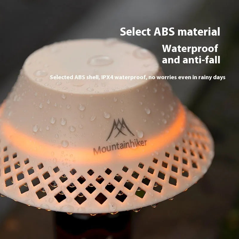 Beige wine bottle shaped camping lantern with LED lights and USB-C charging port