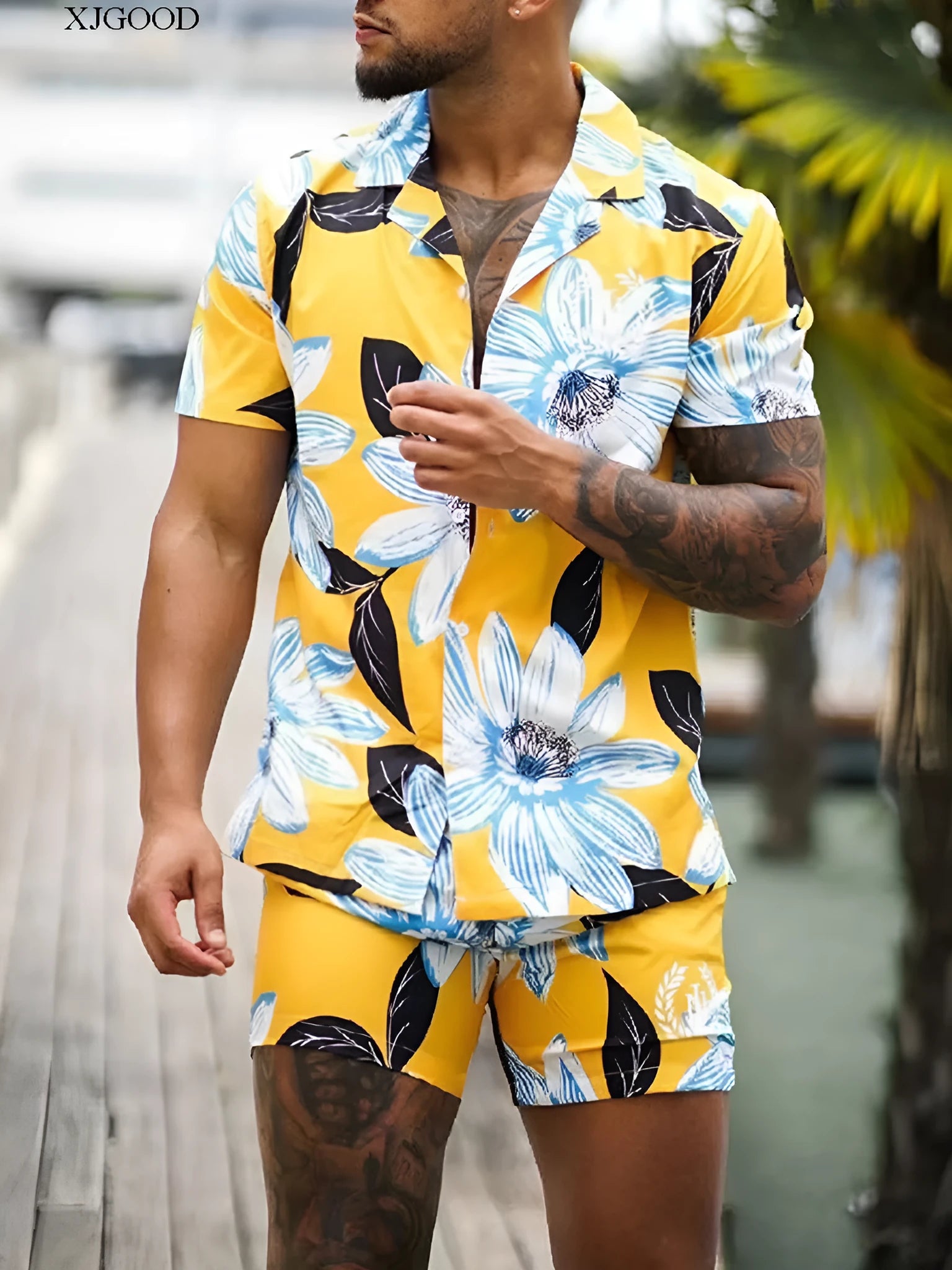Men's Hawaiian floral two-piece set in picture colour with short-sleeved shirt and shorts on a light background
