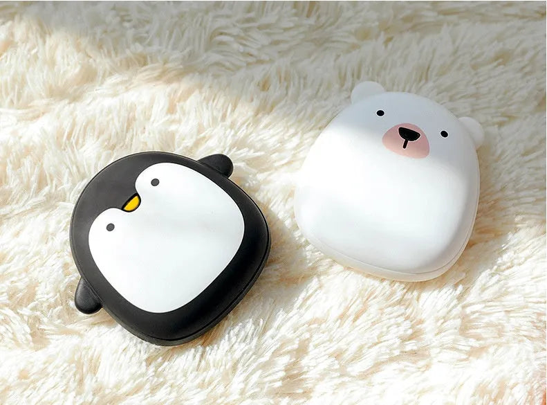 Cute cartoon penguin and polar bear design USB rechargeable electric hand warmer.