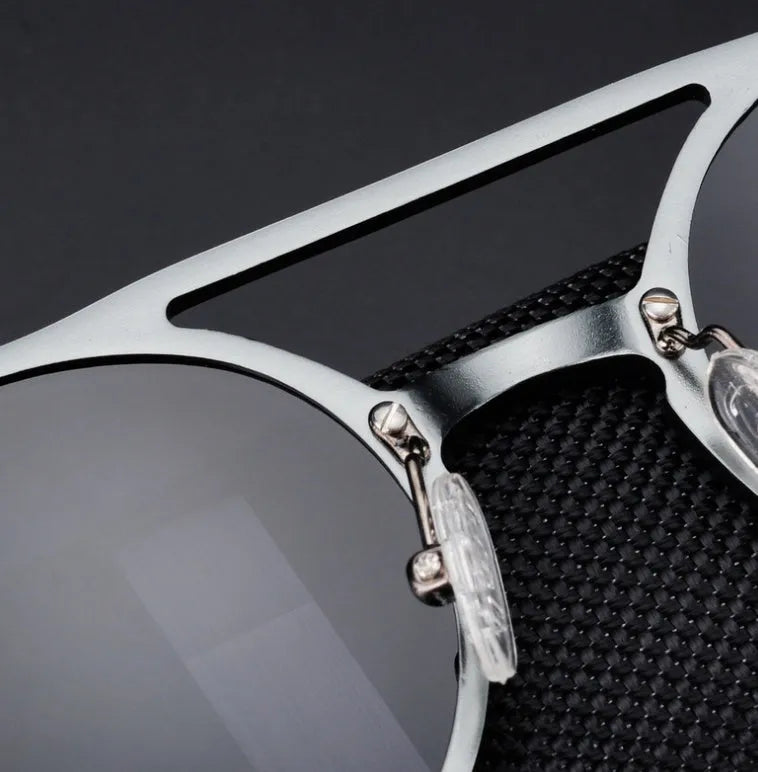 Men's polarised vintage round sunglasses with black aluminium magnesium frame and grey lens