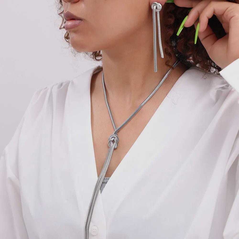 Gold knotted tassel necklace and matching earrings set with snake chain