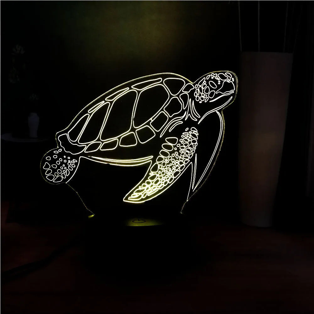 3D acrylic turtle-shaped LED night light displaying one of its 16 colour options.