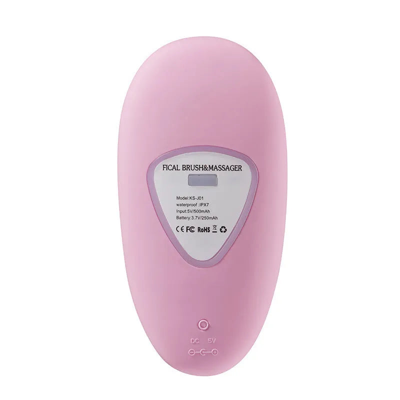 Mini electric facial cleansing brush with silicone head in pink, USB cable, compact 12x6x2.5cm
