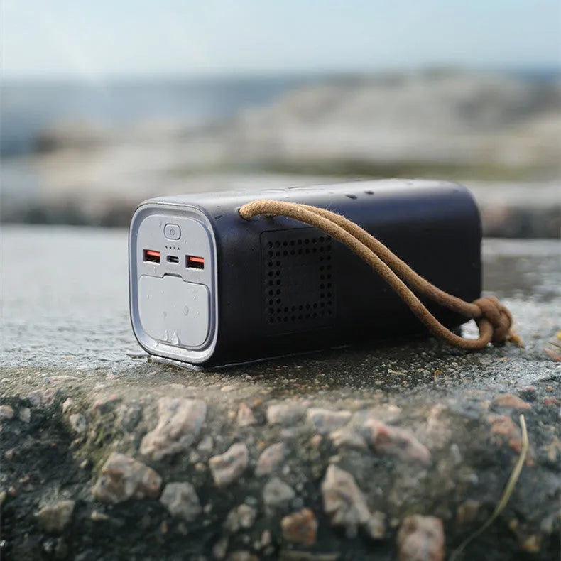 Black emergency power bank with solar panel, 200W output, and compact 70x70x162mm dimensions