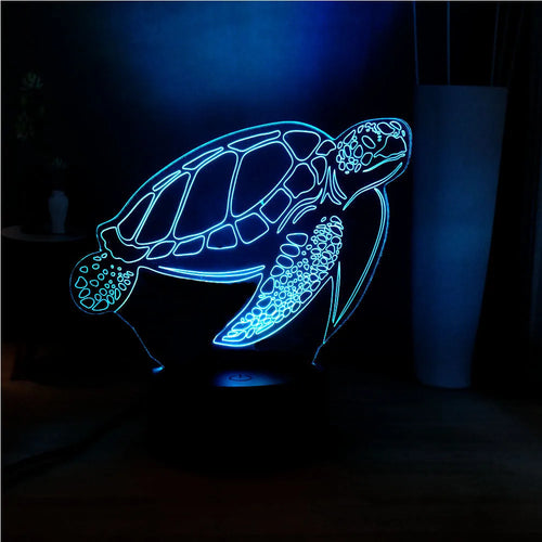 3D acrylic turtle-shaped LED night light displaying one of its 16 colour options.
