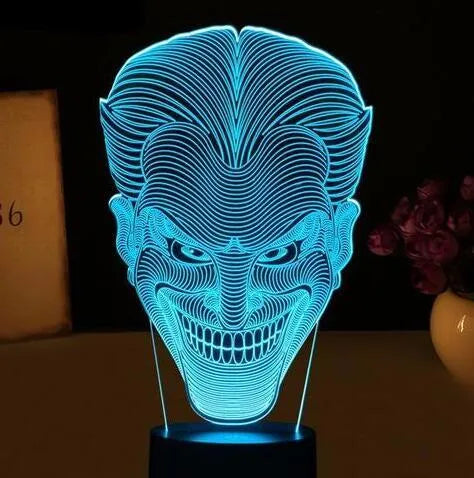 USB-powered 3D acrylic LED table lamp showing multiple colour options and remote control.