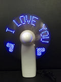 White handheld mini fan with a blue and red LED display showing 'I Love You' and a heart pattern.