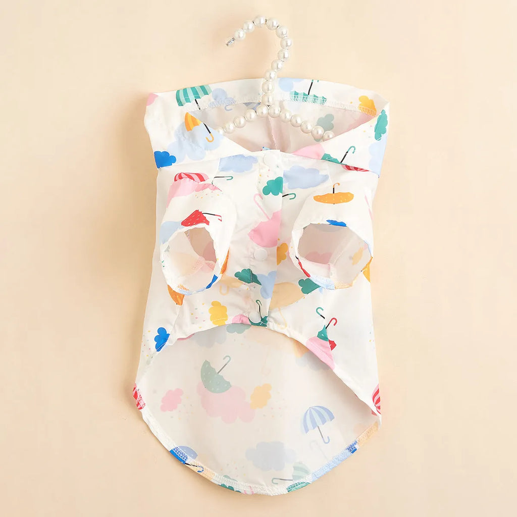 Colourful cartoon umbrella pattern pet raincoat for dogs or cats, available in sizes XS to XL.