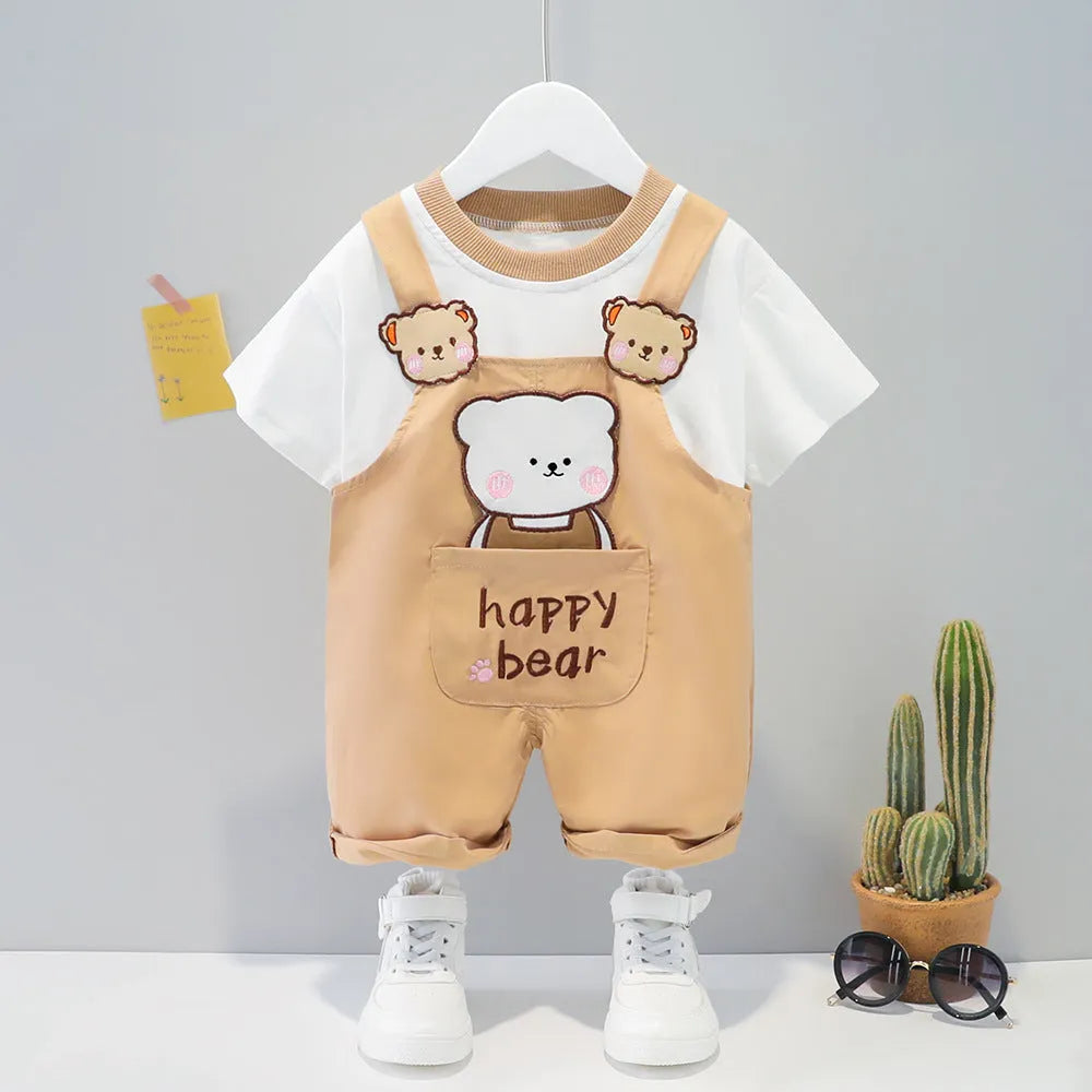 Baby wearing yellow cartoon short-sleeved overalls with adjustable straps