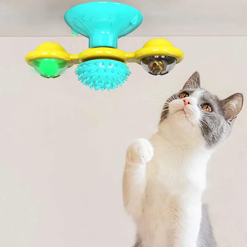 Cat rotating windmill toy with suction base on floor, two transparent bins, luminous ball, teeth grinding function, blue yellow green colour