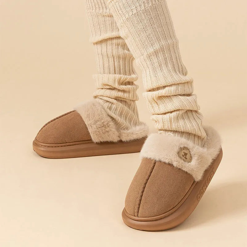 Pair of thick-soled fleece slippers in multiple colour options on a white background.
