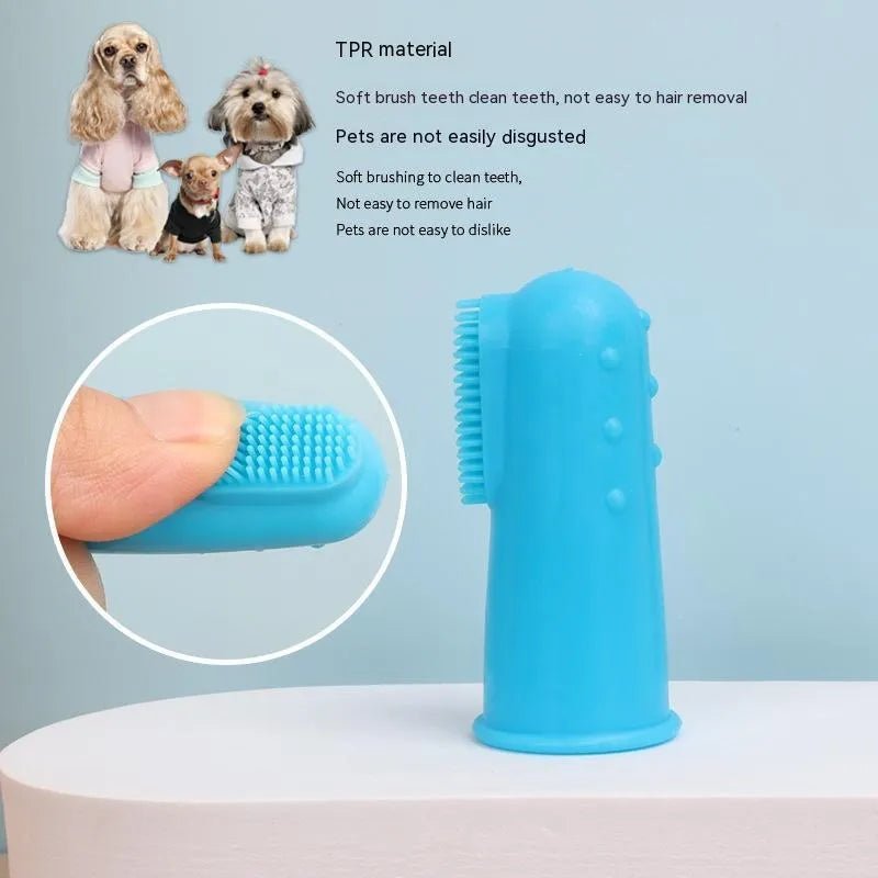 Boxed set of 4 pet finger toothbrushes in pink and blue TPR material on white background
