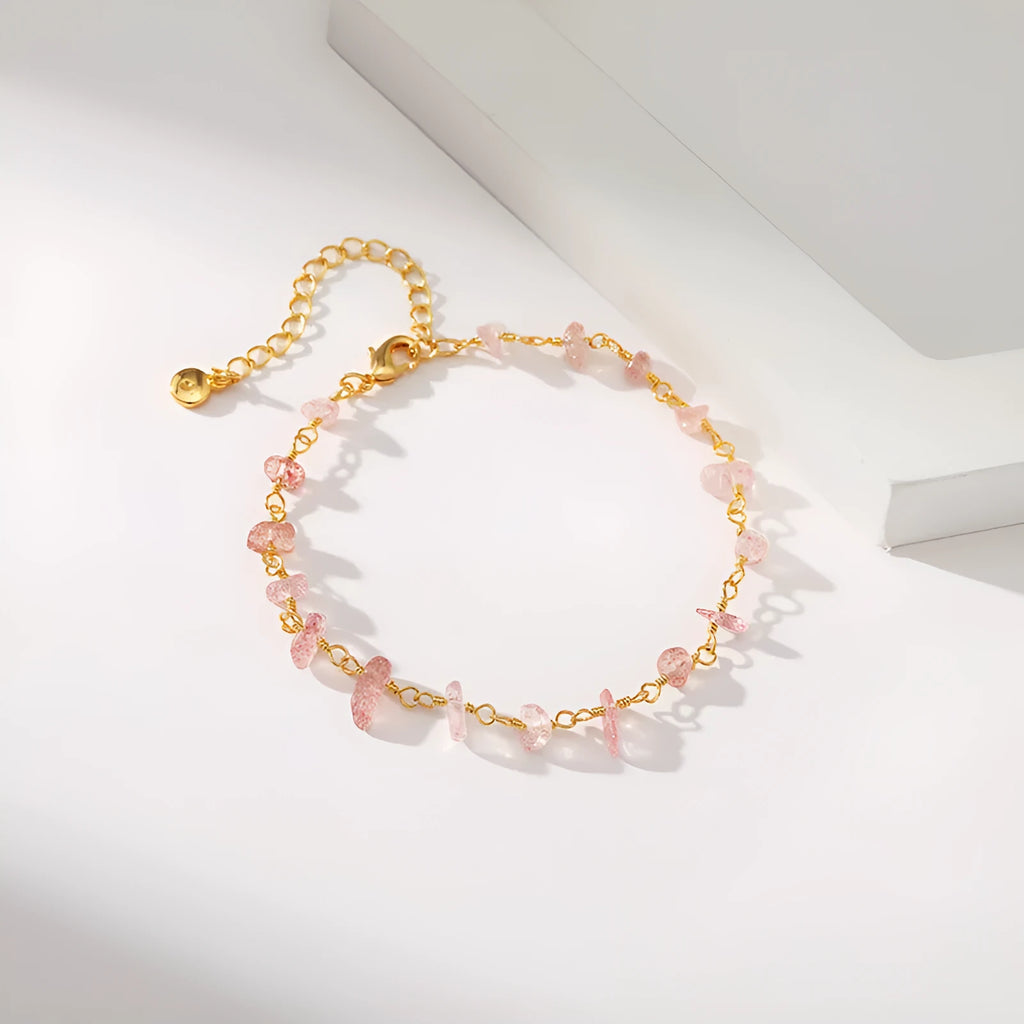 Geometric 18K copper women's bracelet with crystal details and a natural gravel texture, shown in multiple colour options.