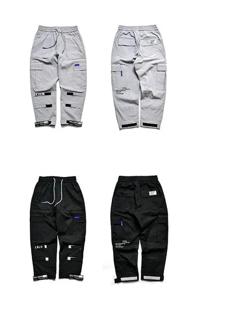 VantageGo black cotton streetwear joggers with elasticated waist, side view on model