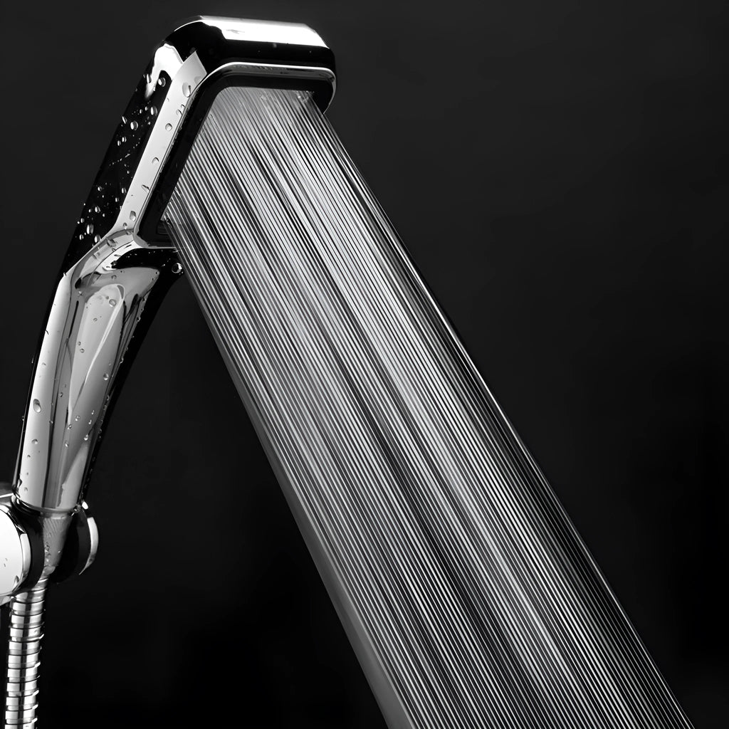 Orange hand-held pressurised shower unit with hose, showing rain shower head and control button.